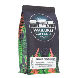 An Organic French Roast bag of coffee with a fern design on it on a white background.